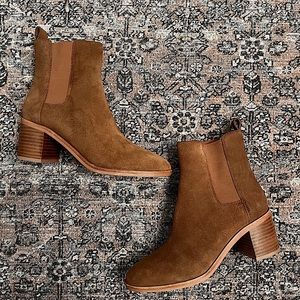 Brand new with sticker on the bottom and tissue from manufacturer still in boot.